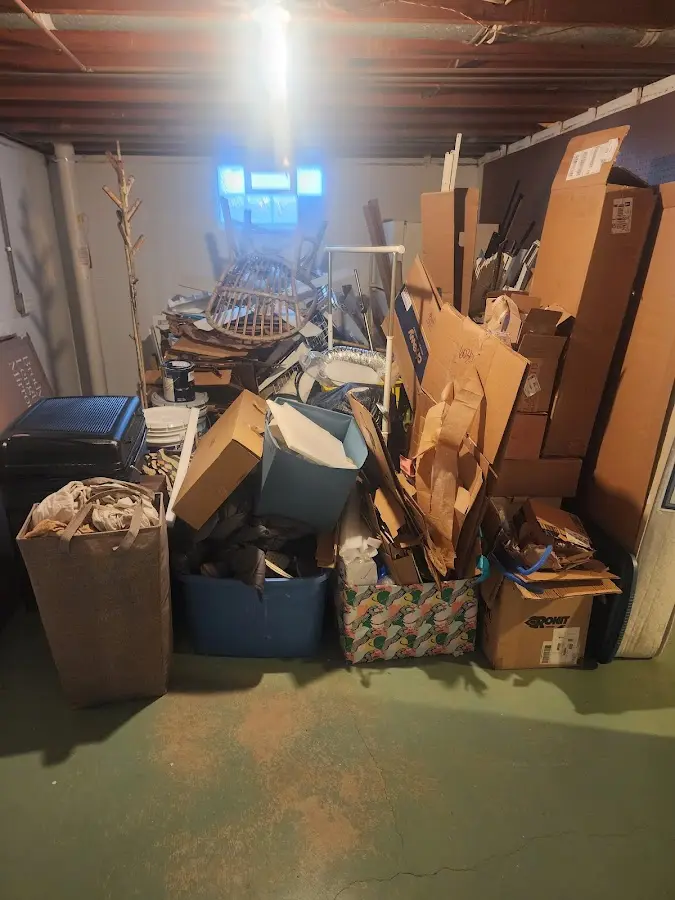 Roll-off dumpster container at job site for 6 Yard Dumpster Rental in Twin Lakes